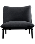 The Moes Morgan Outdoor Chair is a modern accent seat in dark gray, featuring a soft Olefin fabric cushion and backrest, with four slender black metal legs, displayed against a white background.