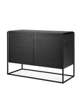 The Monolit Sideboard - 2 door by Ethnicraft features a minimalist, contemporary design with clean lines, a rectangular silhouette, flat front panels, and an open black metal frame base. Expertly crafted from Solid European oak in black.