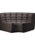 The Ethnicraft N701 Sectional Sofa - Dark Grey features a tufted, cushioned backrest and seat with sleek European design, shown against a white background.