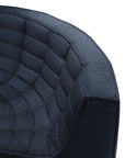 Close-up of the Ethnicraft N701 Sectional Sofa in Graphite (High Performance Fabric), showcasing quilted, padded seat and backrest with textured, stain-resistant material and curved edges.