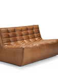 The Ethnicraft N701 Modular Sofa - Old Saddle features a modern armless design in brown full aniline leather with tufted backrest and seat, low profile, and clean lines, shown against a plain white background.