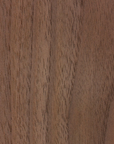 Close-up of Material Swatches by Natadora + Tolv, showcasing smooth brown wood with natural grain patterns, fine dark lines, and lighter patches for an organic look.
