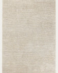 The Armadillo&Co Palermo Rug - Bone is a square, light beige area rug with a subtle textured pattern and minimalist design, hand knotted for durability and elegance, shown on a plain background.