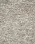 Close-up of the Quarry Rug - Stone by Loloi, featuring a looped pile pattern in light gray and a soft, textured surface made from 100% wool.