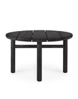 The Ethnicraft Quatro Outdoor Side Table 23.5 in black teak features a round slatted top and four sturdy legs, shown on a white background.