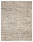 The Loloi Rayan Rug - Silver is a large hand-woven rectangular area rug, featuring light beige and gray tones with subtle lines for a speckled, natural fiber look.