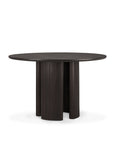 The Ethnicraft Roller Max Round Dining Table in dark mahogany features a smooth top and a unique base with vertically ribbed, curved panels arranged in a circle, crafted from solid mahogany for lasting elegance.