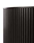 Close-up of Ethnicrafts Roller Max Round Side Table - Mahogany, a cylindrical side table with storage and vertical grooves, showing its dark wood finish; only the upper portion is visible against a white background.