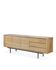 The Ethnicraft Shadow Sideboard with Legs - 88 is crafted in light European oak, featuring three left cabinet doors, three right drawers, and sleek black metal legs for a modern look.