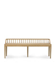 The Spindle Bench - Oak by Ethnicraft is a minimalist solid European oak bench featuring a spindle backrest, clean lines, and four legs with a natural finish, shown against a plain white background.