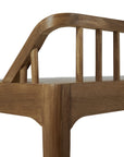 Close-up of the Ethnicraft Spindle Bench in Natural Teak, featuring a smooth, curved backrest with vertical slats that highlight the natural wood grain and minimalist spindle-inspired design.