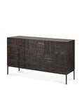 The Ethnicraft Tabwa Sideboard - 3 door features modern dark wood, detailed linear geometric Tabwa-inspired motifs on the front, and slim black metal legs, shown against a white background.