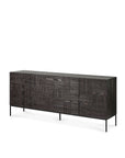 The Ethnicraft Tabwa Sideboard - 4 door features intricate geometric motifs, slim black metal legs, and a smooth dark wooden top.