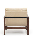 The Troubadour Lounge Chair by Wooden Stories features leather upholstery and an espresso oak frame, showcased from the back against a plain white background.