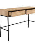 The Ethnicraft Whitebird Desk - Oak is a modern wooden console with two open drawers and slim black metal legs, crafted from solid European oak, shown against a white background.