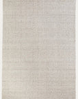 The Winnow Rug - Alabaster by Armadillo&Co is a rectangular, light beige handmade wool rug with a subtle textured pattern, shown on a neutral background.