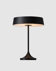 The China LED Table Lamp - Black by Seed Lighting features a matte black finish, wide circular shade, slender stand, and dimmable spin base, shown against a light gray background.