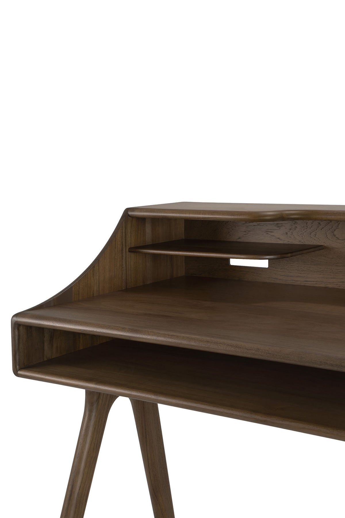 The Ethnicraft Flow Desk features angled legs, a raised back shelf, and an open cubby beneath the main desktop. Its dark, smooth wood finish makes it a stylish choice for any modern workspace.