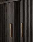 Close-up of dark wooden cabinet doors with vertical grooves and two rectangular brass handles, highlighting the texture and modern design of the Ethnicraft Roller Max Filing Cabinet—an elegant office storage solution.