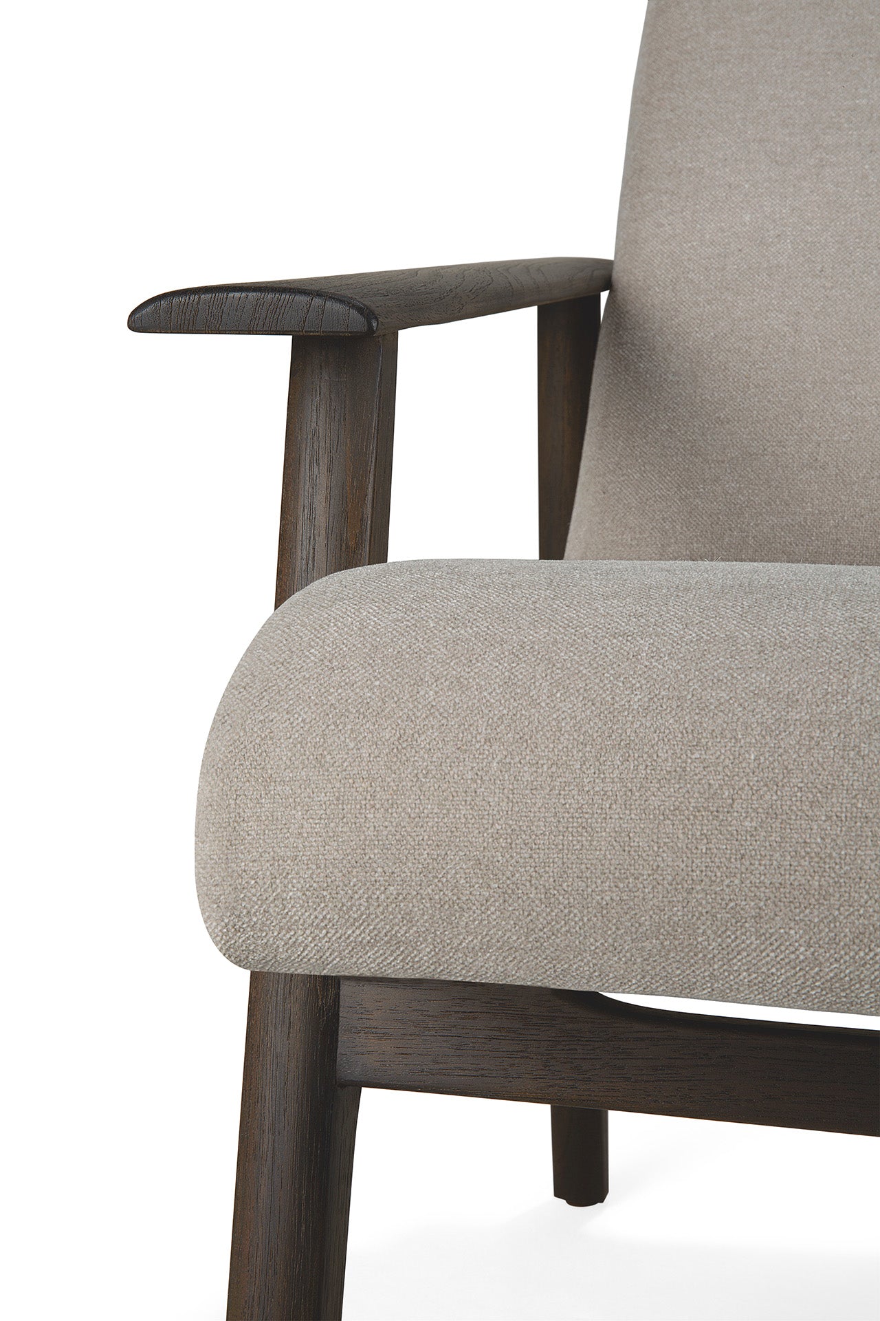 Close-up of the Ethnicraft Aspekt Lounge Chair - Dark Brown Teak, featuring light beige fabric upholstery and dark wooden armrests and legs, set against a plain white background.