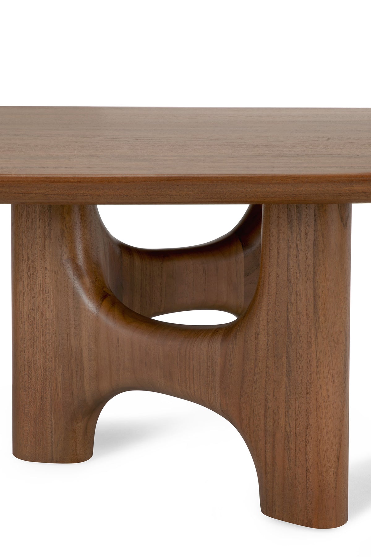 Low Ethnicraft Flow Coffee Table | Teak Wild Brown in solid wood with a thick rectangular top and a sculptural, hollowed-out support base.