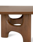 Low Ethnicraft Flow Coffee Table | Teak Wild Brown in solid wood with a thick rectangular top and a sculptural, hollowed-out support base.