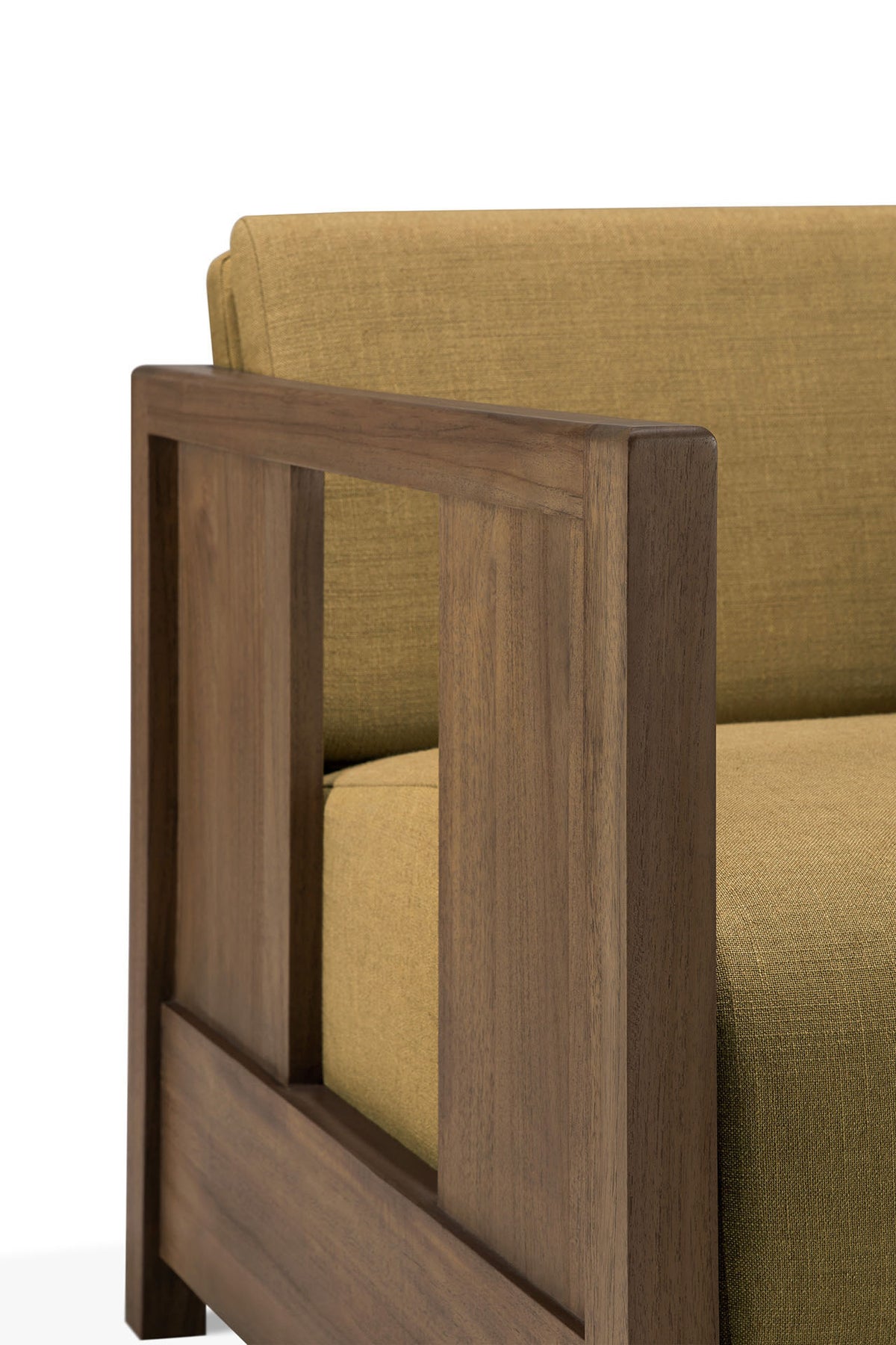 Close-up of the Roan Lounge Chair in Amber by Ethnicraft, showcasing its modern silhouette with an olive-green cushion and a wooden armrest featuring a rectangular open-frame design—an elegant detail characteristic of Ethnicraft’s refined style.