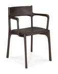 The Ethnicraft PI Dining Chair - Teak Dark Brown with arms features a modern curved backrest, slim angled legs, and seamlessly connected armrests, embodying minimalist elegance in solid teak.