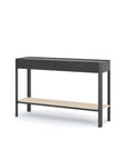 The Nell Console by Wooden Stories features a dark rectangular top, two drawers, black legs, and a light oak shelf in solid wood—showcasing timeless Scandinavian design in black oak with stone—displayed on a white background.
