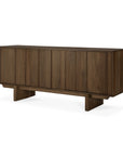 The Ethnicraft Pillar Sideboard - Teak Wild Brown features a modern rectangular design, paneled doors, sturdy short legs, and a minimalist look—perfect for contemporary spaces.