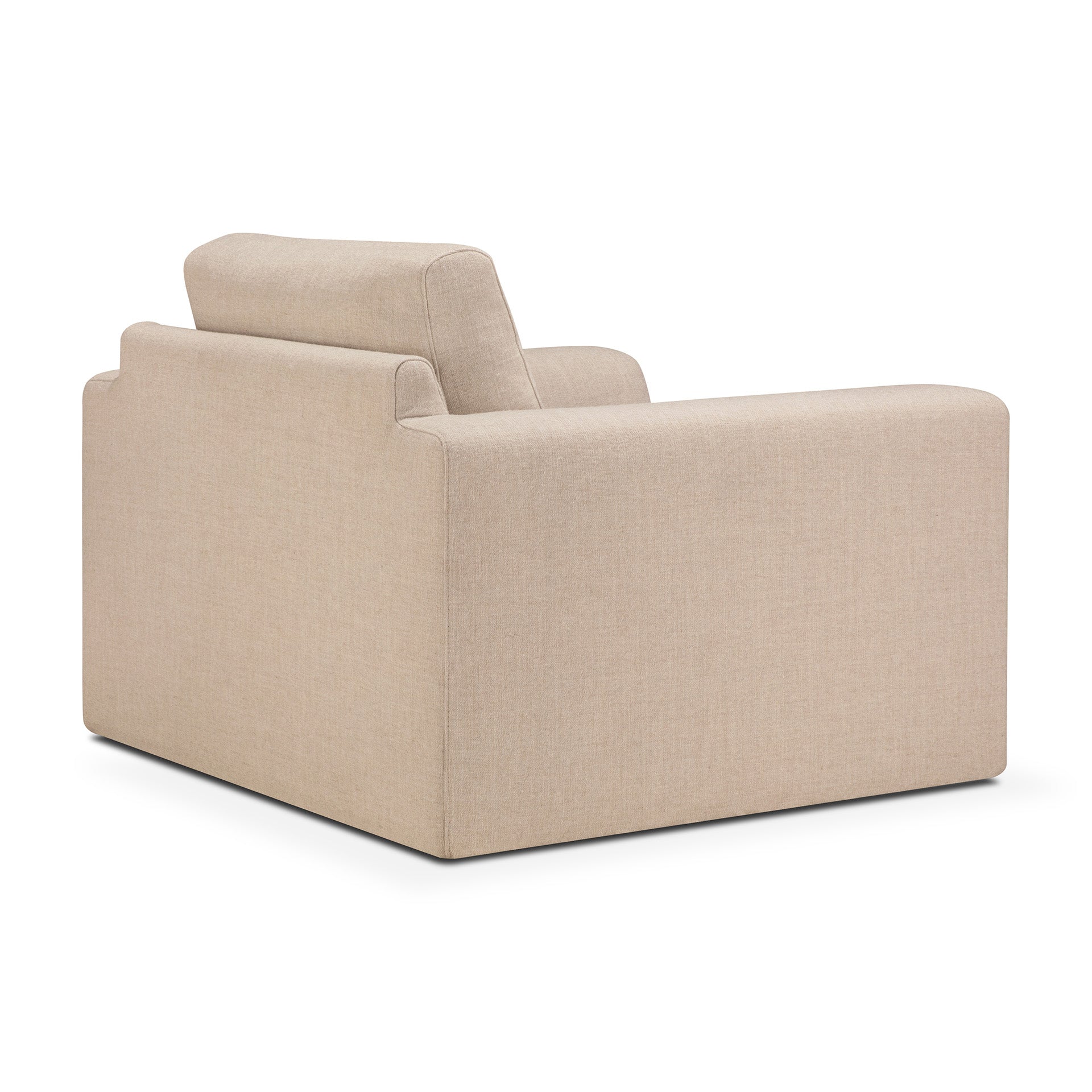The Ease Lounge Chair by Ethnicraft is a beige, modern armchair with a boxy design and soft fabric upholstery, featuring high density foam for comfort; shown from the rear side angle against a white background.