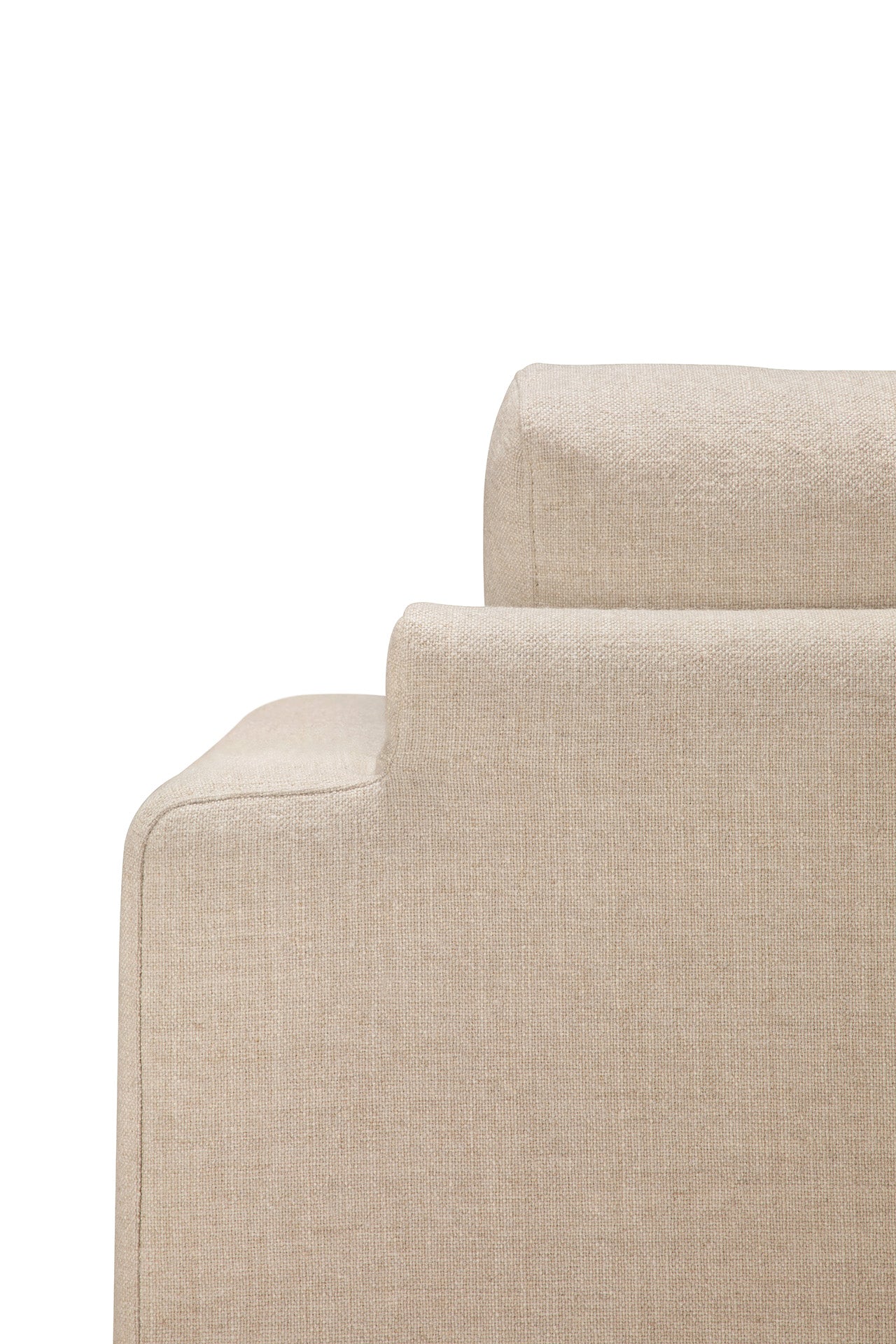 Close-up of the back and armrest of the beige Ease Lounge Chair by Ethnicraft, showcasing its textured fabric, high-density foam, and minimalist modern design against a white background.