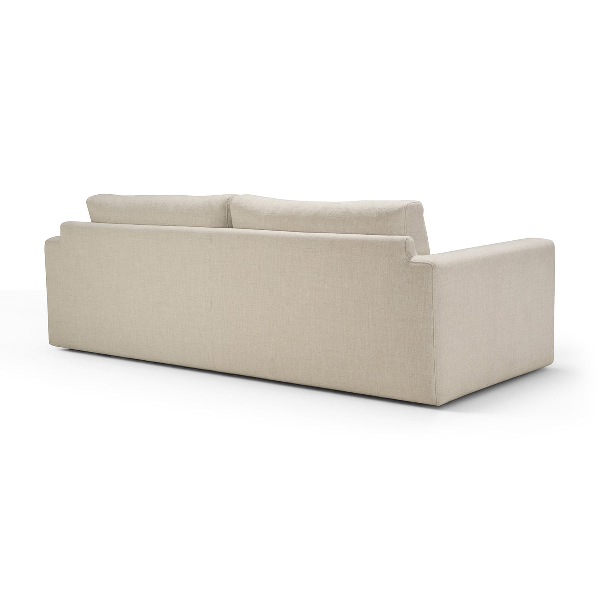 A beige, three-seater Ethnicraft Ease sofa viewed from the back, upholstered in Leche fabric.