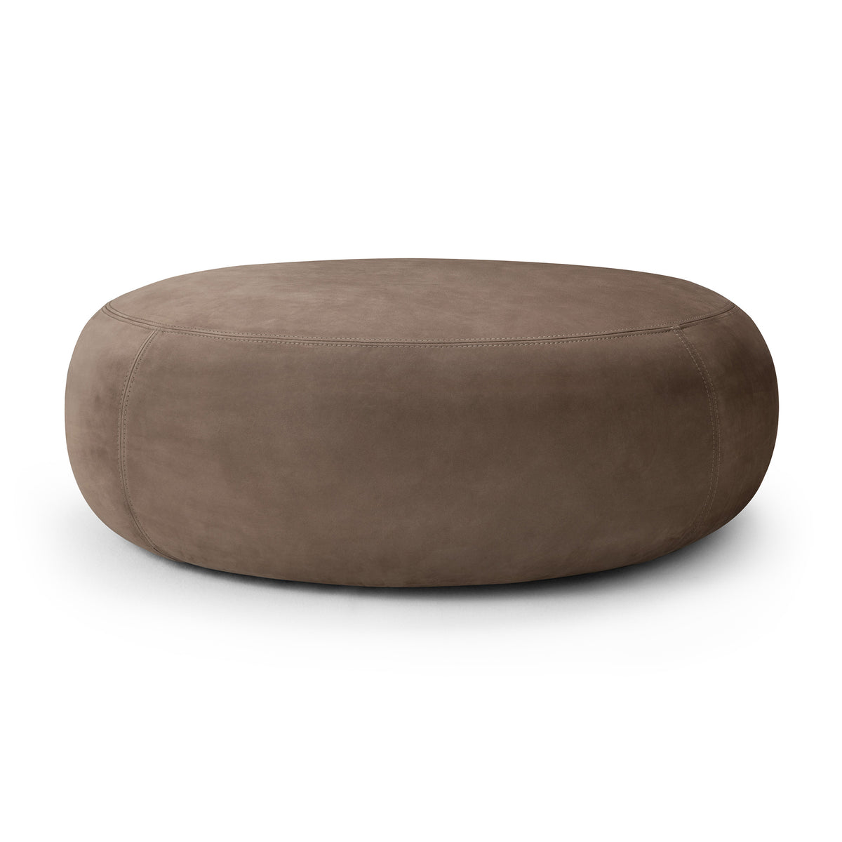 A round, low-profile Ethnicraft Orb Pouf | Fawn Nubuck Leather in muted brown.