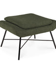 The Ethnicraft Barrow Footstool - Pine Green features a textured green cushion, rounded edges, and outward-angled black metal legs—ideal for bringing vintage-inspired charm to any room.