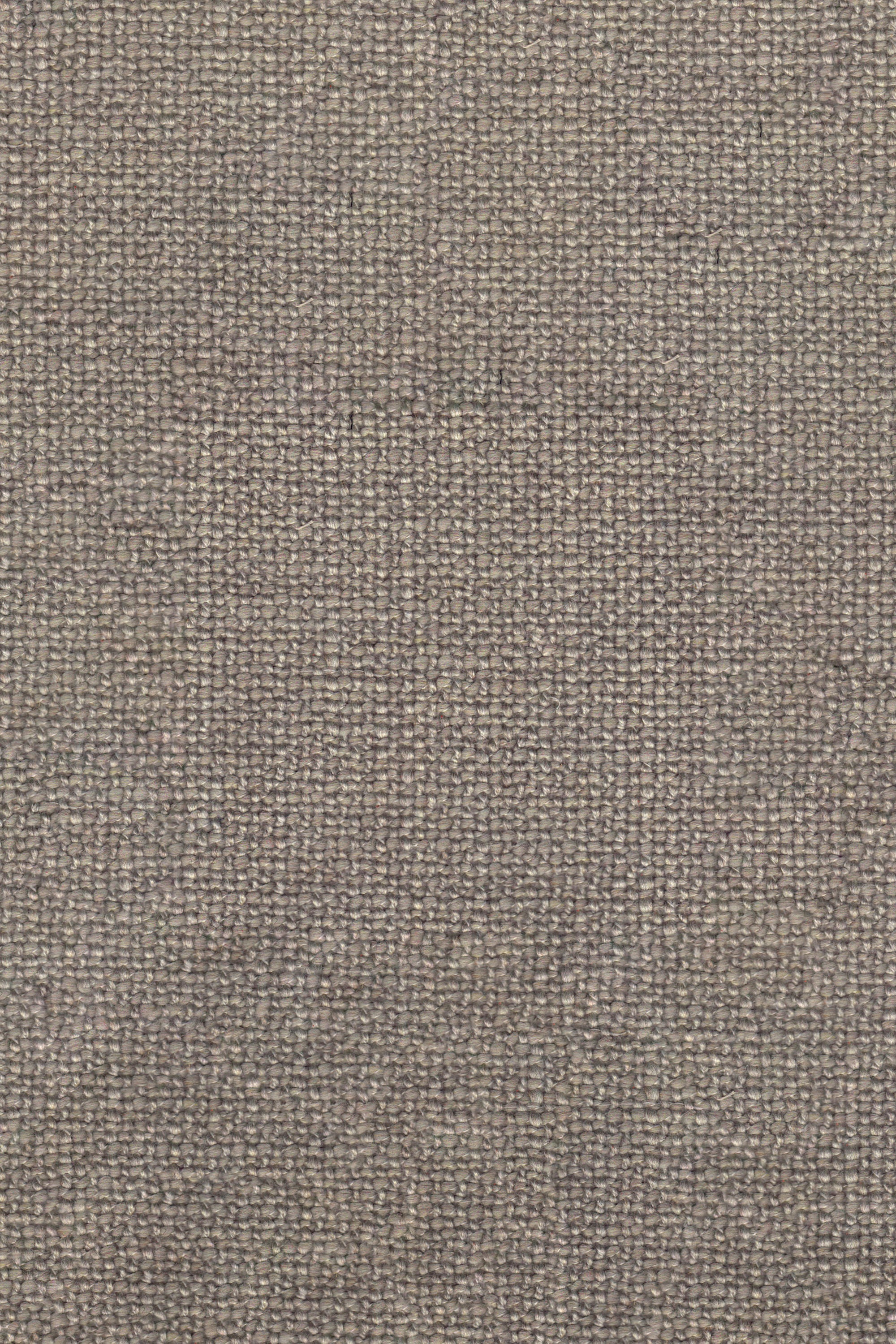 Close-up of the N701 Modular Sofa - Beige by Ethnicraft, showcasing its woven fabric with a coarse, textured surface in neutral beige and gray tones. The clearly visible weave pattern features small, interlaced threads running vertically and horizontally—perfect for enhancing the tactile appeal of European sofa design or seamlessly upholstering a customizable sectional.