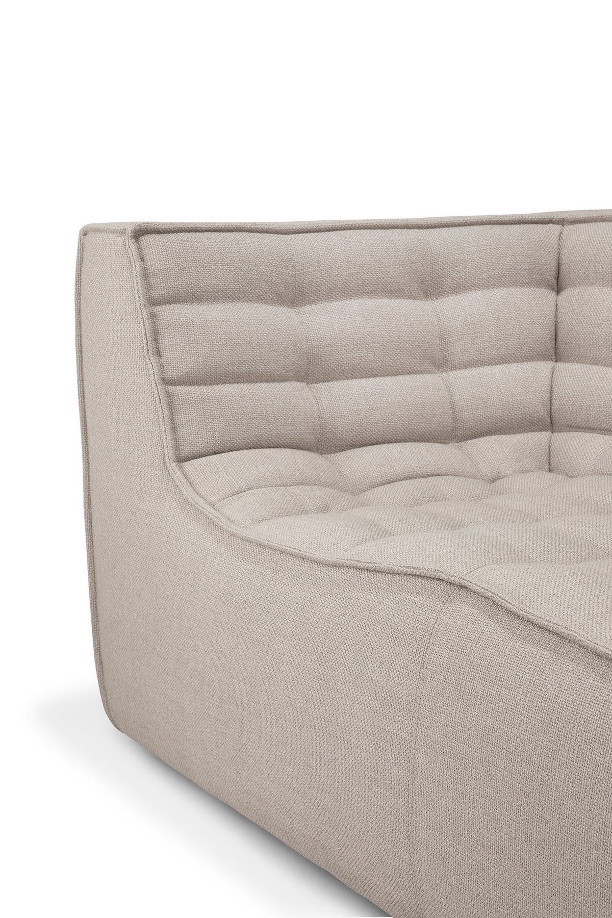Close-up of the N701 2-Seater Sofa in Beige by Ethnicraft, showcasing a quilted, tufted backrest and seat with clean, soft lines and textured upholstery—highlighting exceptional European craftsmanship and a sophisticated modular design.