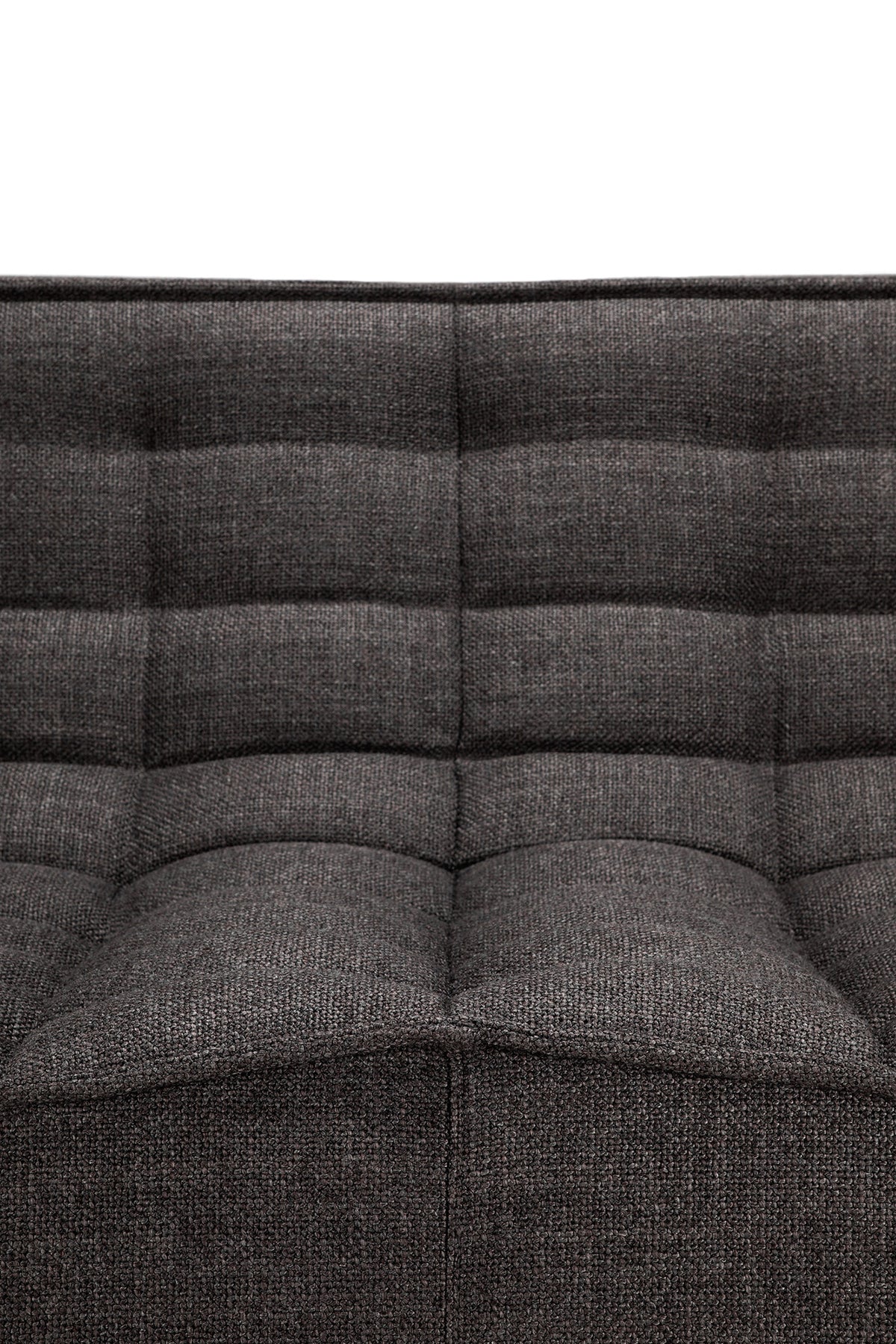 Close-up of the Ethnicraft N701 3-Seater Sofa in Dark Grey, highlighting its tufted fabric back and seat with rectangular stitching and textured material, set against a plain white background.