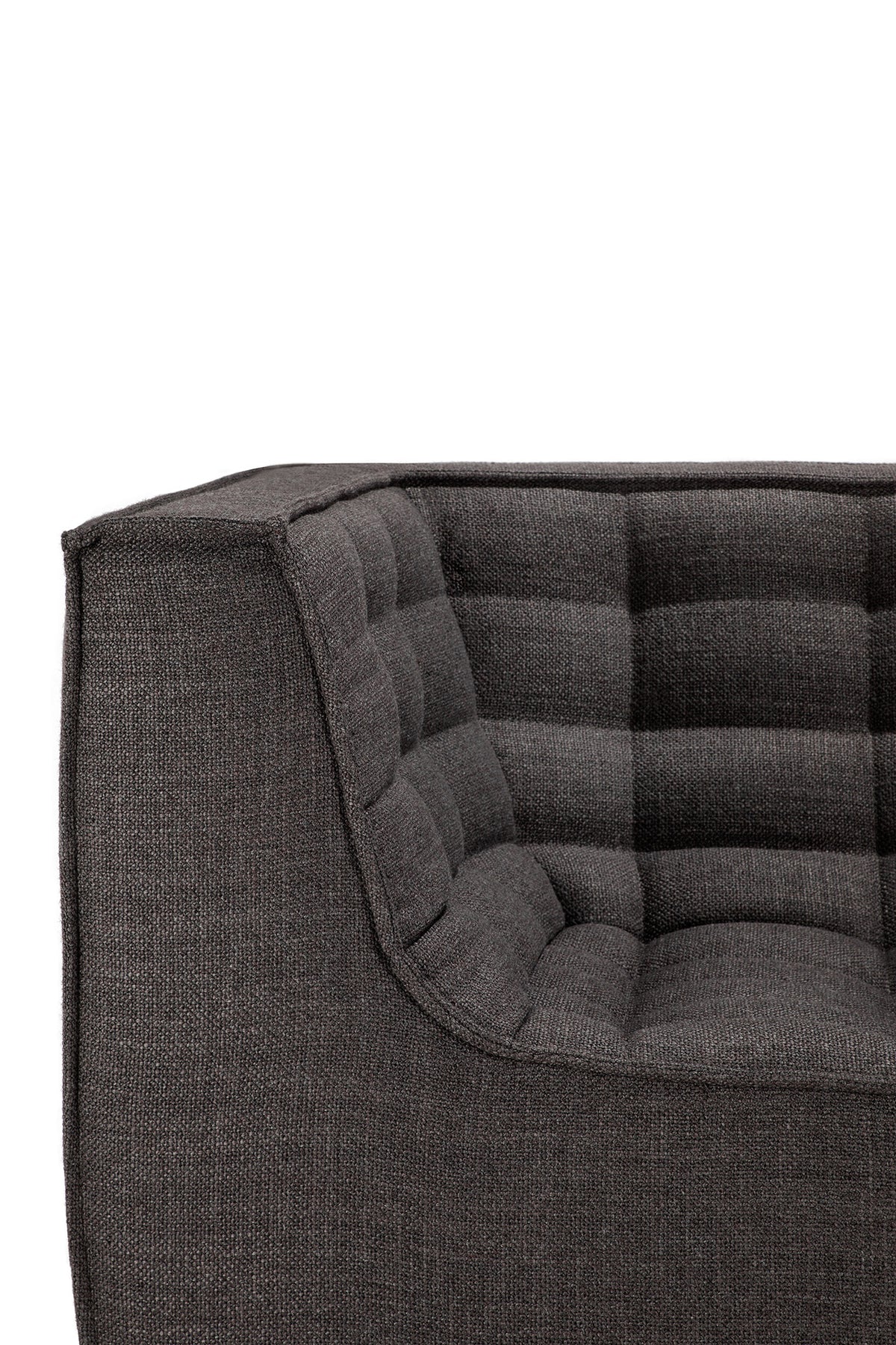 Close-up of the Ethnicraft N701 2-Seater Sofa in dark grey, inspired by European design, featuring a square, grid-patterned cushion and clean, angular lines.