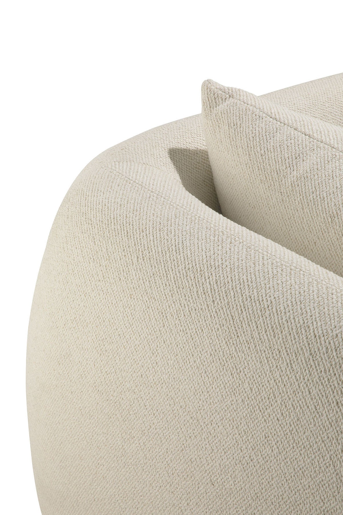 Close-up of the Figur Sofa | 2 seater by Ethnicraft—a modern, cream-colored textured fabric sofa featuring rounded armrests and a matching cushion. This piece effortlessly blends comfort with timeless design, making it an ideal addition to any contemporary living space.