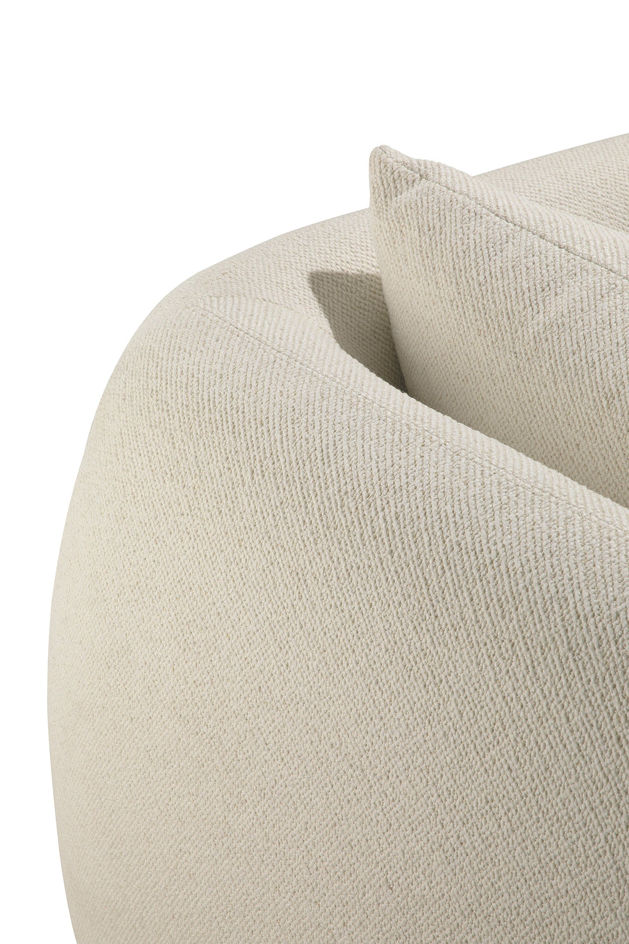 Close-up of the Ethnicraft Figur Sofa in beige textured fabric with matching cushion, set against a white background. The image highlights the sofa's rounded edge and fabric detail, ideal for contemporary interiors.