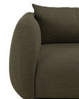 Close-up of the left armrest and cushion of the Ethnicraft Figur Sofa | 3 Seater—crafted in dark olive green textured fabric with rounded, plush contours—an inviting piece perfect for contemporary living.