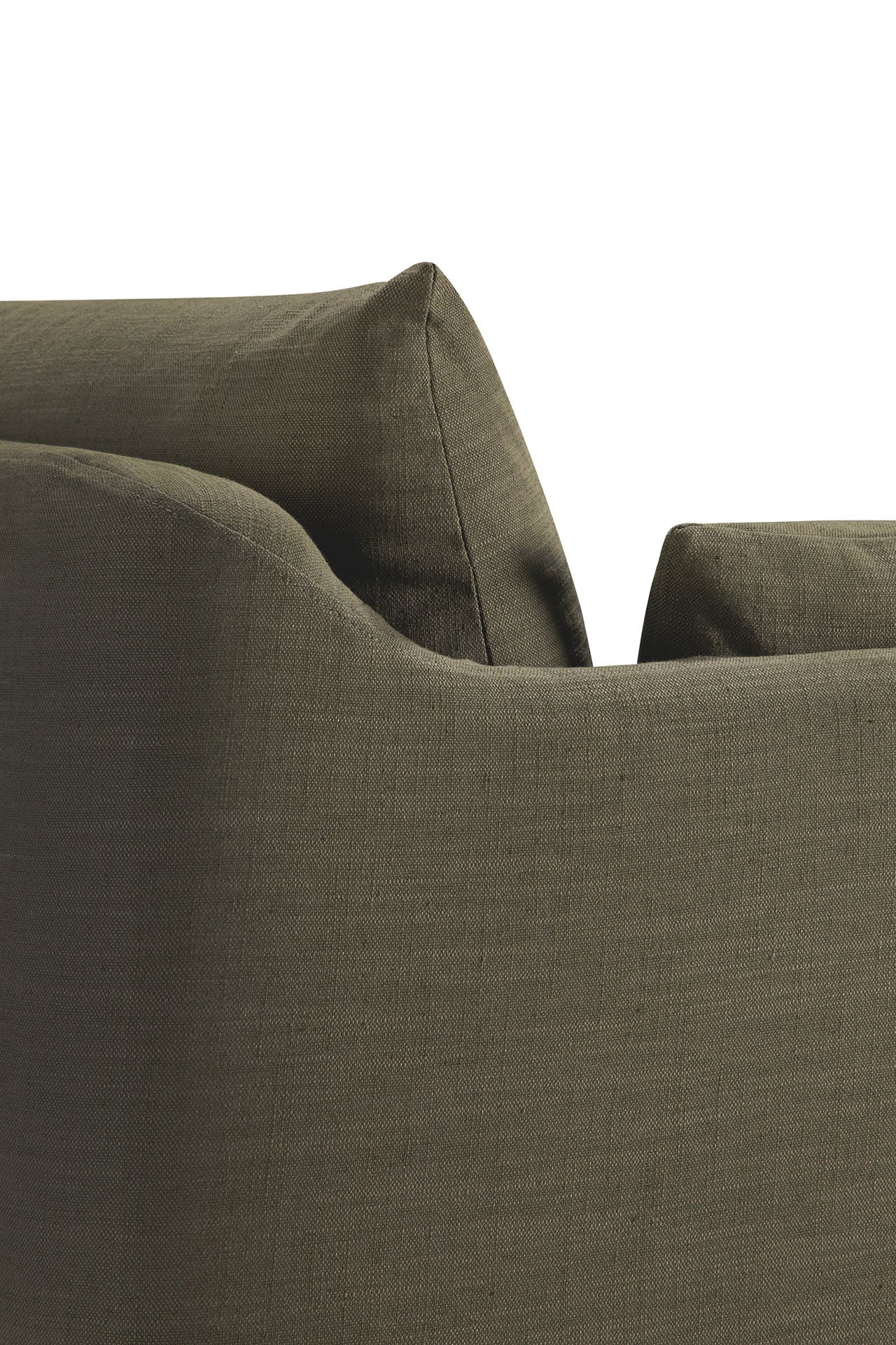 Close-up of the Weave Sofa - Green by Ethnicraft, featuring linen blend upholstery. The olive green back and cushion create a relaxed living ambiance against a white background.