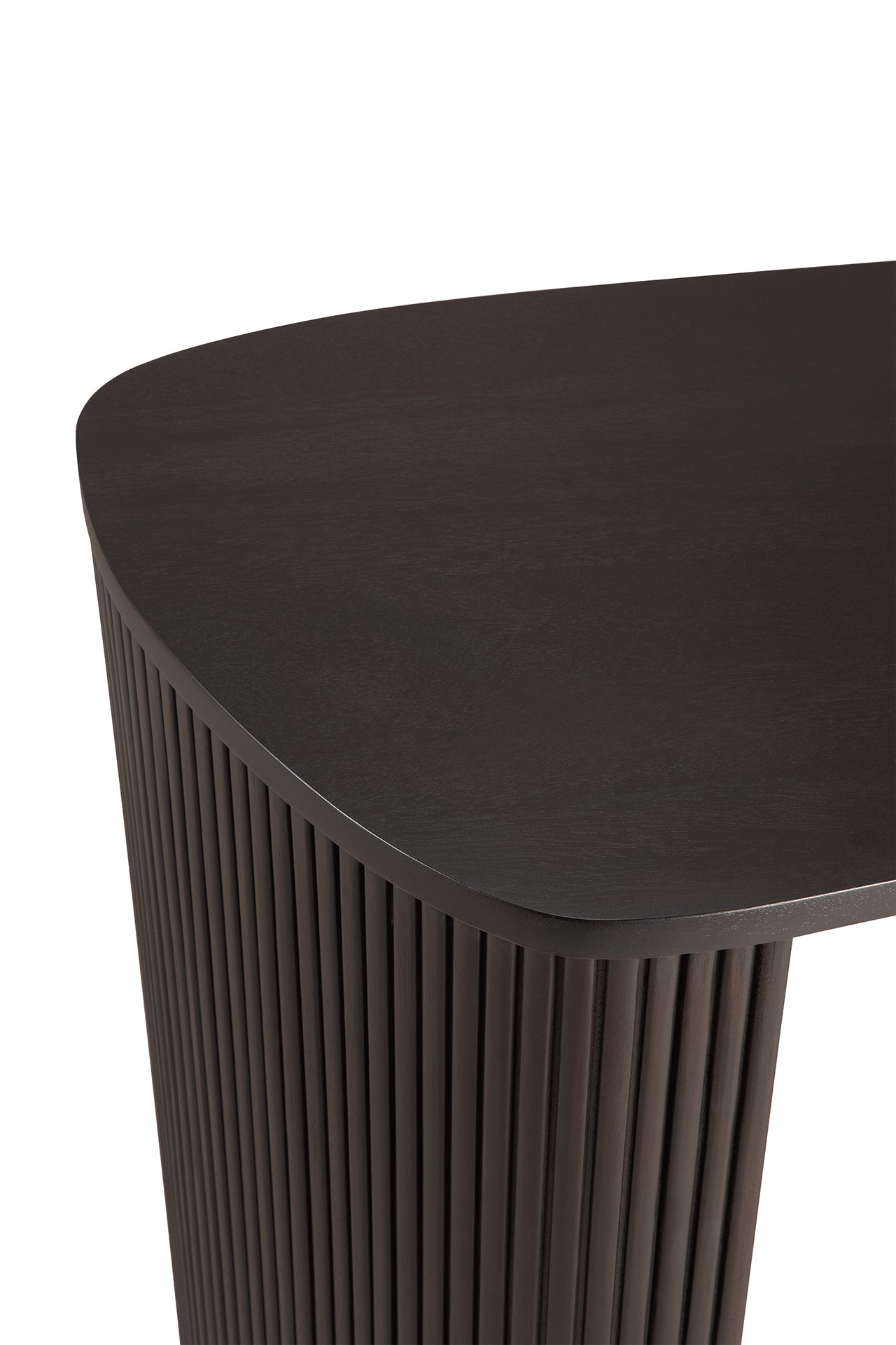 Close-up of the Ethnicraft Roller Max Desk featuring dark wood, a rounded edge, and vertically grooved legs, set against a white background.