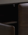 Close-up of a dark Ethnicraft PI Light hanging sideboard with a cabinet door slightly ajar, revealing an interior shelf and a small magnetic latch.