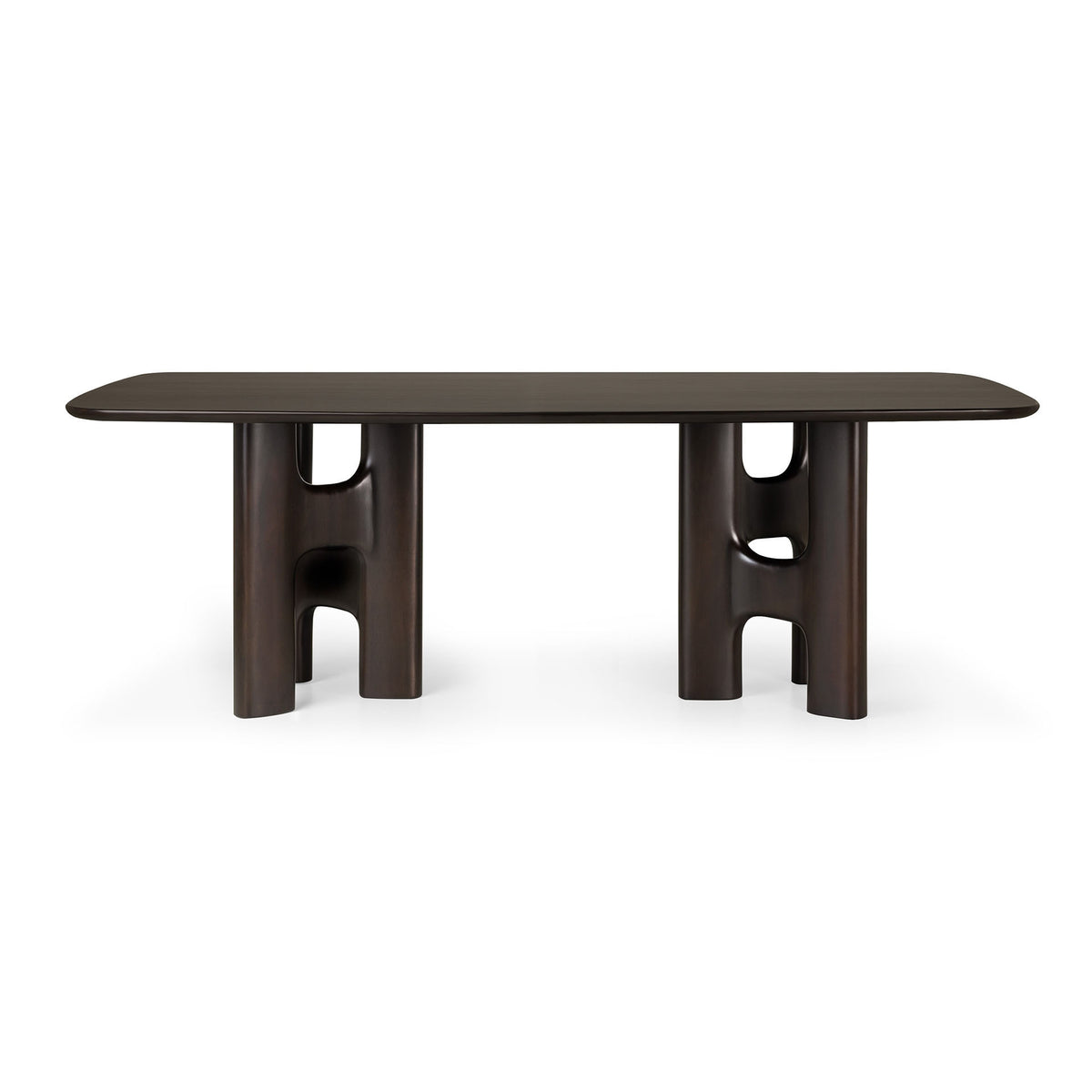 Ethnicraft Flow Dining Table in mahogany rose brown, a solid wood table featuring rounded corners and two sculptural, cutout pedestal legs.