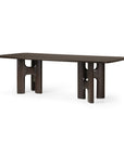 An Ethnicraft Flow Dining Table | Mahogany Rose Brown, featuring a long rectangular top in dark brown supported by two sculptural, arched legs.