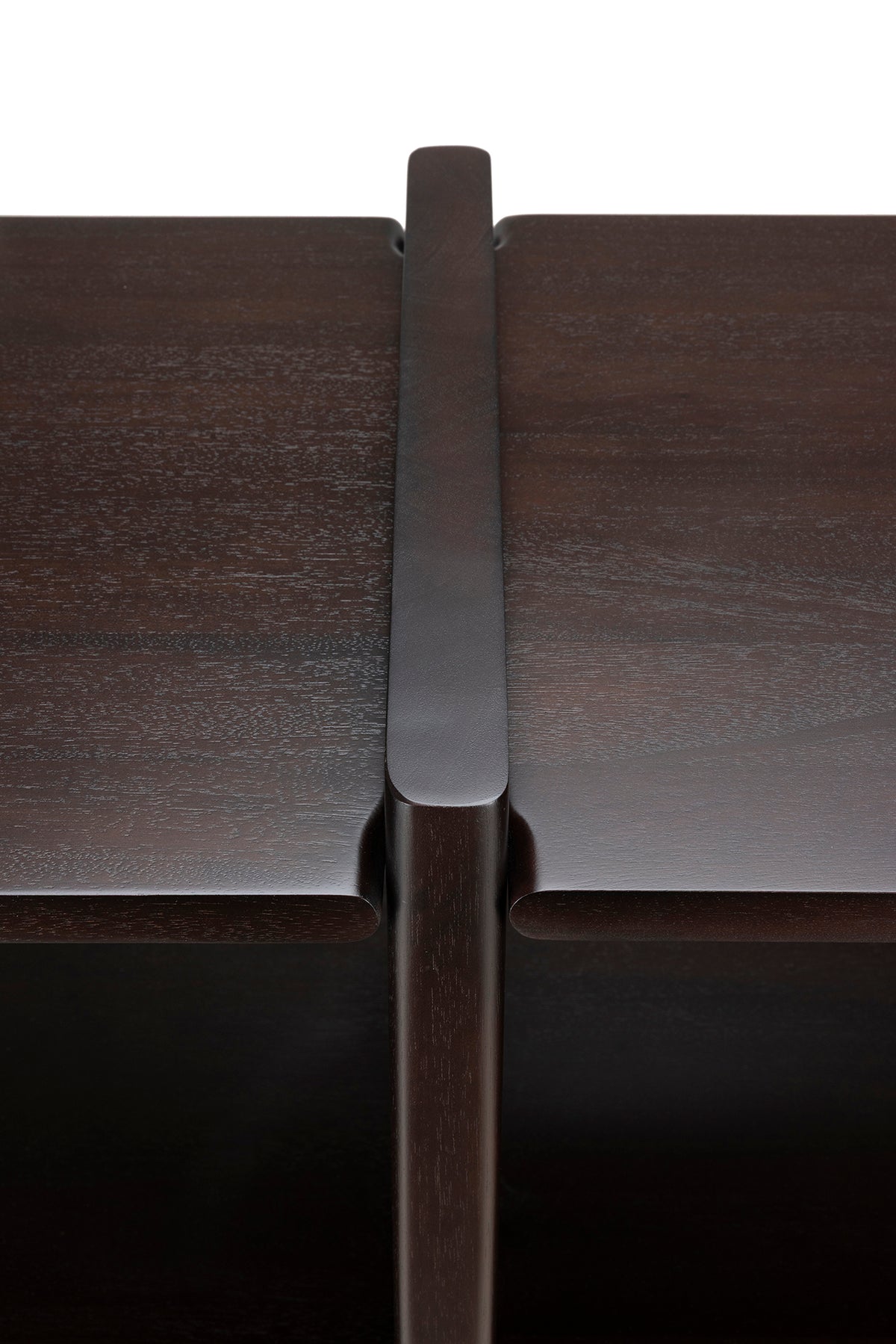 Close-up of the Ethnicraft Mortise Rack, featuring an heirloom-quality dark wood furniture joint with a vertical support piece fitted between two horizontal surfaces.