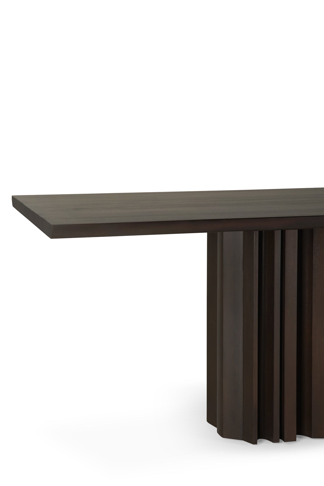 The Sequence Dining Table by Ethnicraft features a modern rectangular design in dark brown mahogany, highlighted by a distinctive geometric base with vertical slats. Shown on a white background.
