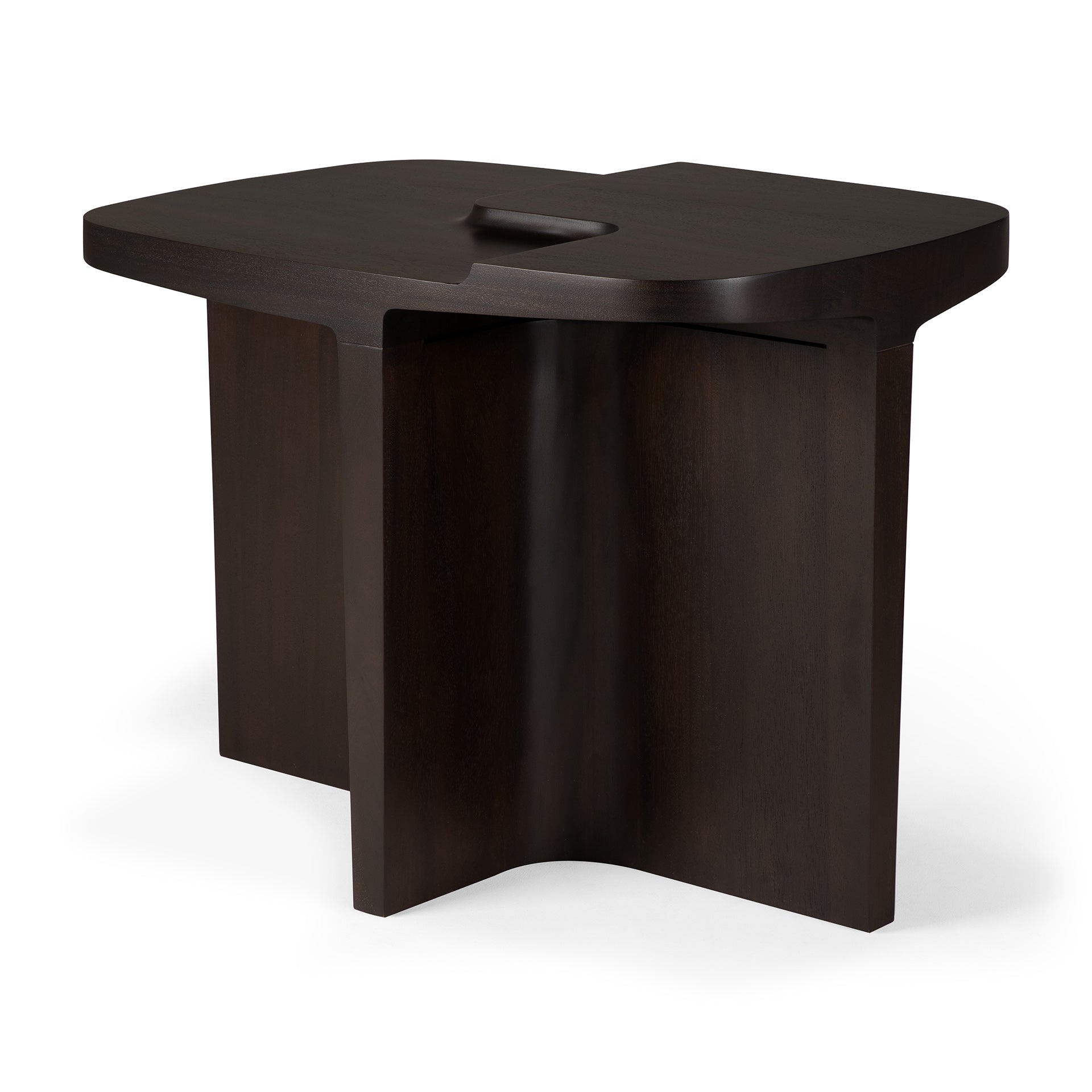 The Ethnicraft Brutalist Side Table is a modern piece crafted from solid mahogany, featuring a geometric base and uniquely curved top with a rounded cut-out, inspired by Brutalist design.